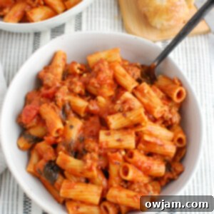 Zesty Sausage Pasta Supper 6 Classic Italian Sausage Pasta with fresh basil garnish