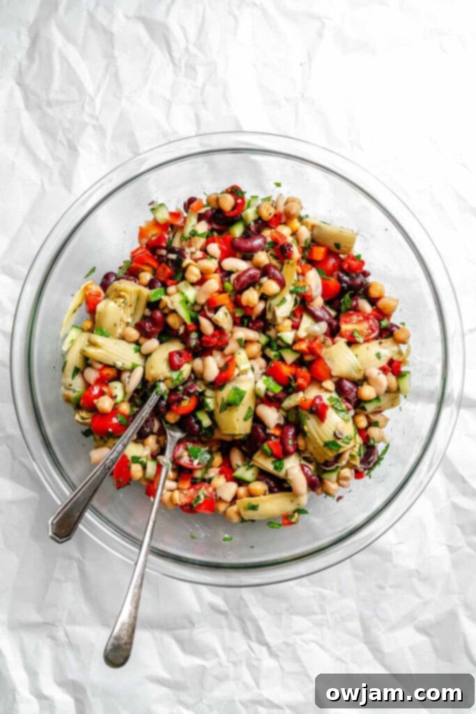 Mediterranean Three Bean Salad in a large serving bowl, ready to be enjoyed.