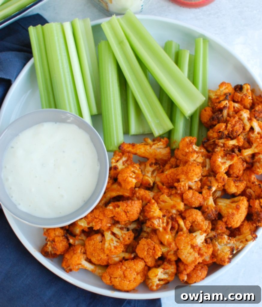 Air Fryer Buffalo Cauliflower on white plate 