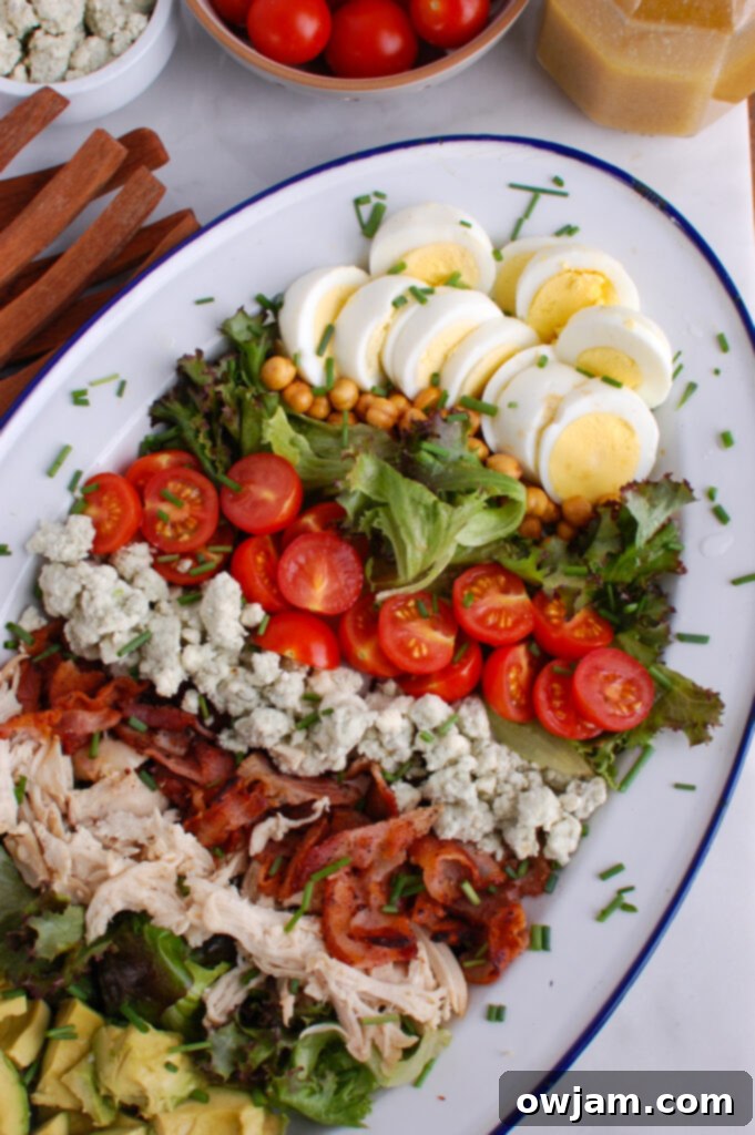 The Ultimate Cobb Salad 5 Close-up of Cobb Salad focusing on the hard-boiled eggs and vibrant ingredients.