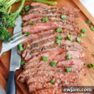 Asian Marinated Flank Steak on cutting board