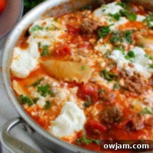 Hearty Skillet Beef Lasagna 7 A delicious Skillet Beef Lasagna, showing the layers of beef, noodles, and cheese.