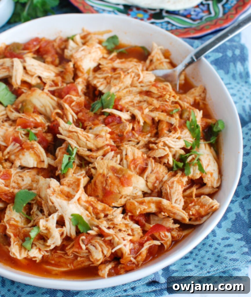 Effortless Instant Pot Shredded Chicken 2 Easy Instant Pot Shredded Chicken in white bowl