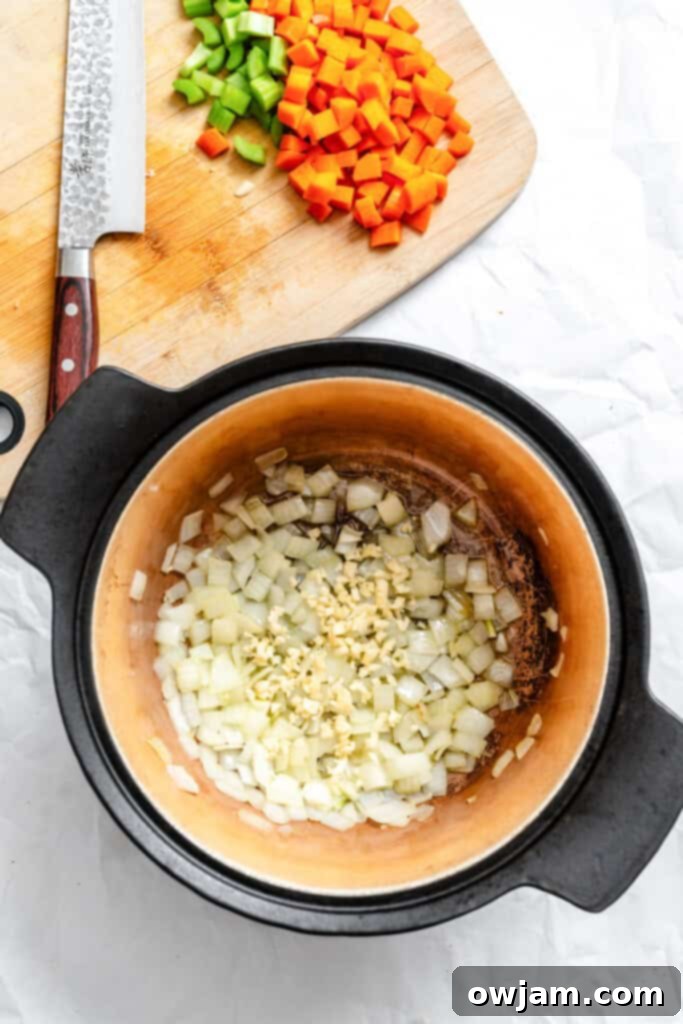 Hearty Homemade Veggie Chili 5 Homemade Vegetarian Chili Recipe onions sauteeing in pot