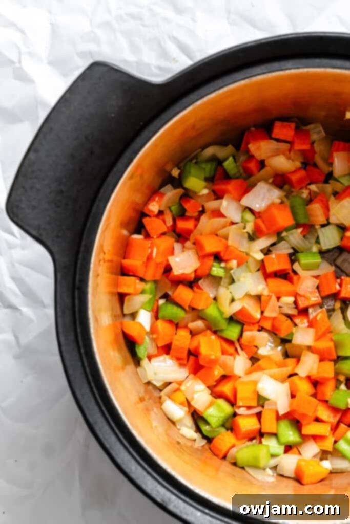 Hearty Homemade Veggie Chili 6 Homemade Vegetarian Chili Recipe carrots and onions sauteeing in pot