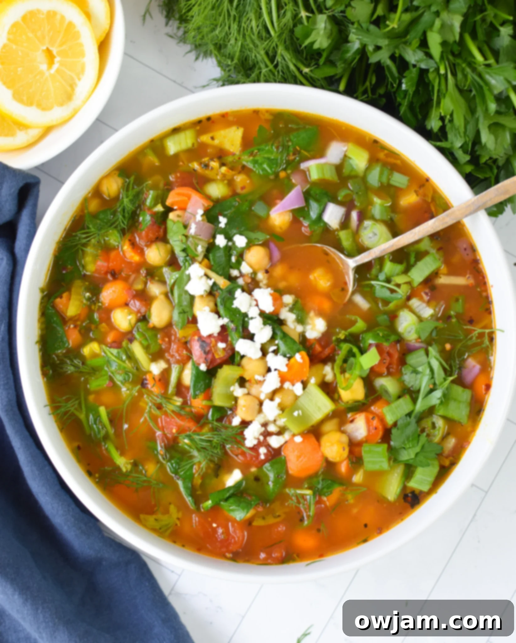Delicious Garbanzo Soup in a bowl with a spoon
