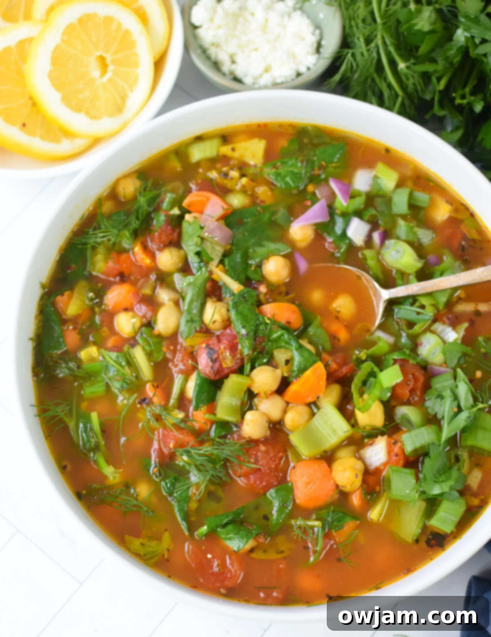 Garbanzo Soup Recipe in a rustic bowl with a spoon.