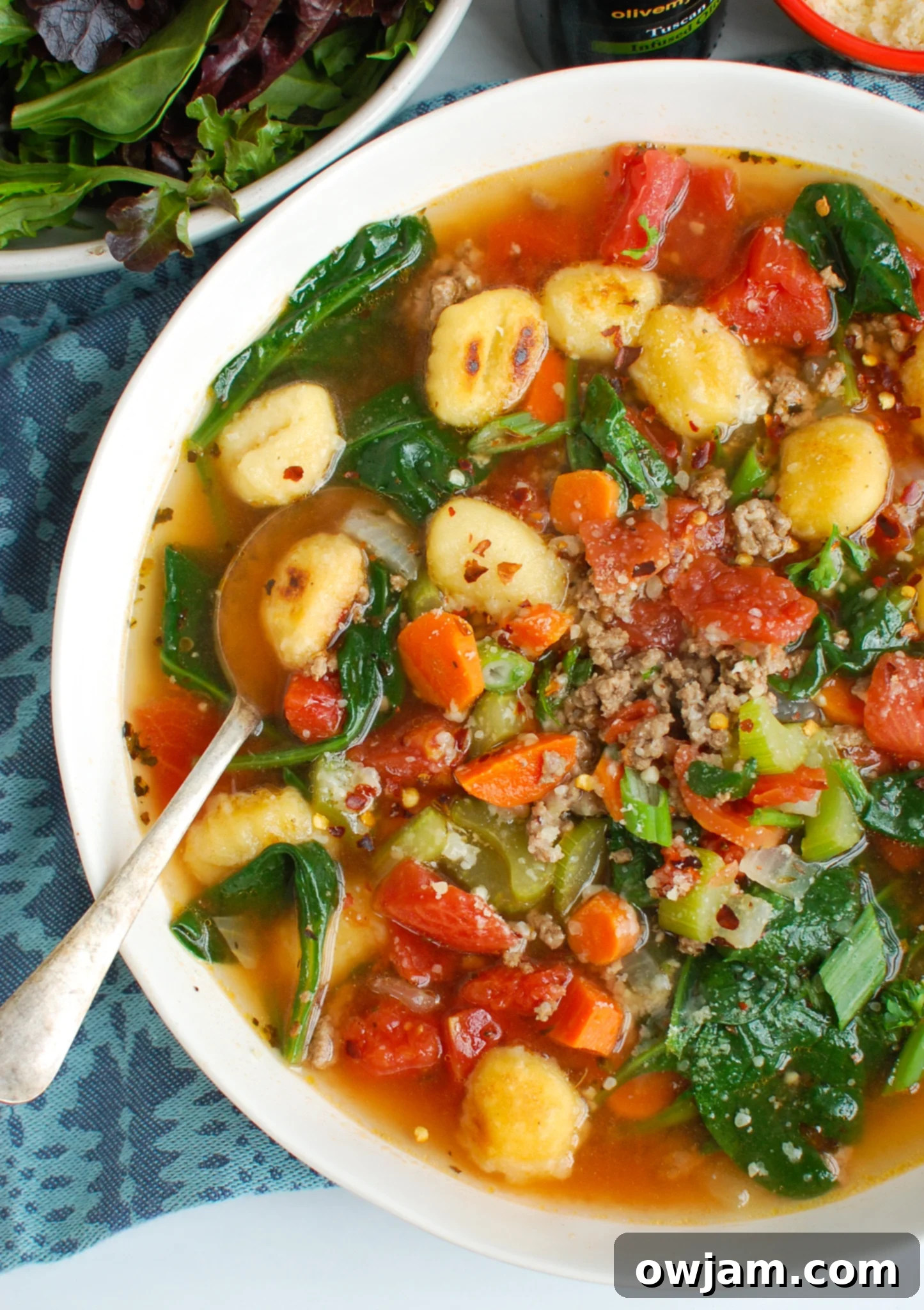 Easy Sausage Gnocchi Soup with spoon. 