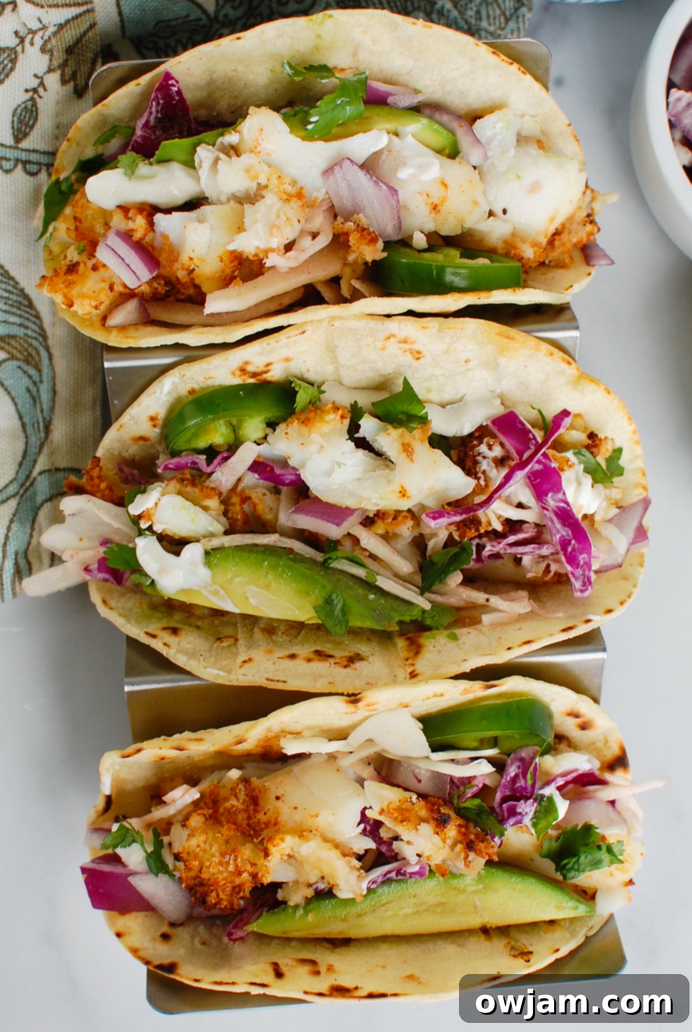 Your Crispy Air Fryer Cod in Just 15 Minutes 5 Air Fryer Cod tacos on plate