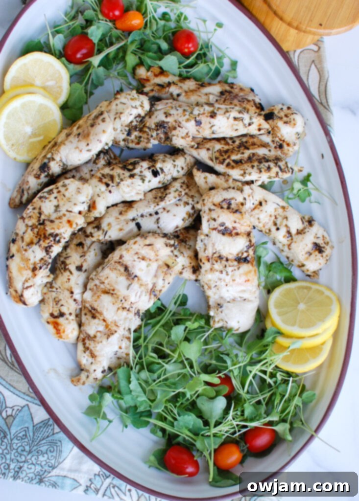 Close-up of Lemon Marinade for Chicken with sliced lemon and herbs