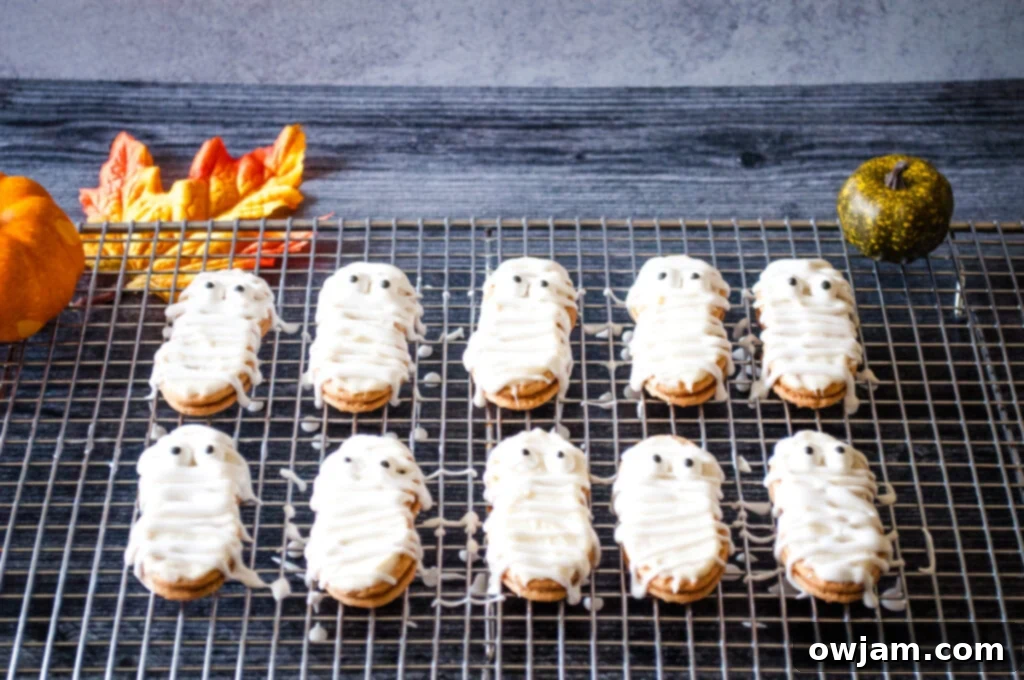 Spooky Bandaged Bites 7 Mummy Cookies on rack
