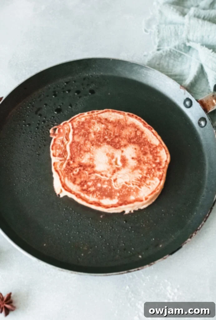 Golden Apple Pancakes 7 Apple Pancakes on skillet