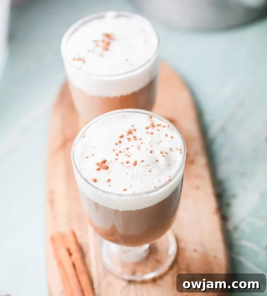 Instant Pot Chai Tea Latte with frothy foam, ready to be enjoyed, highlighting its creamy texture.