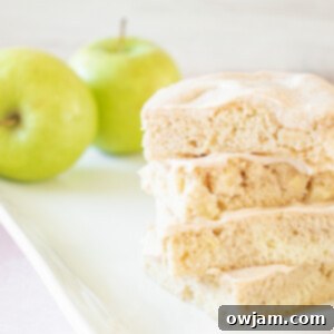 Pumpkin Spice Iced Apple Bars 9 Apple Bars with Pumpkin Pie Spice Icing on plate