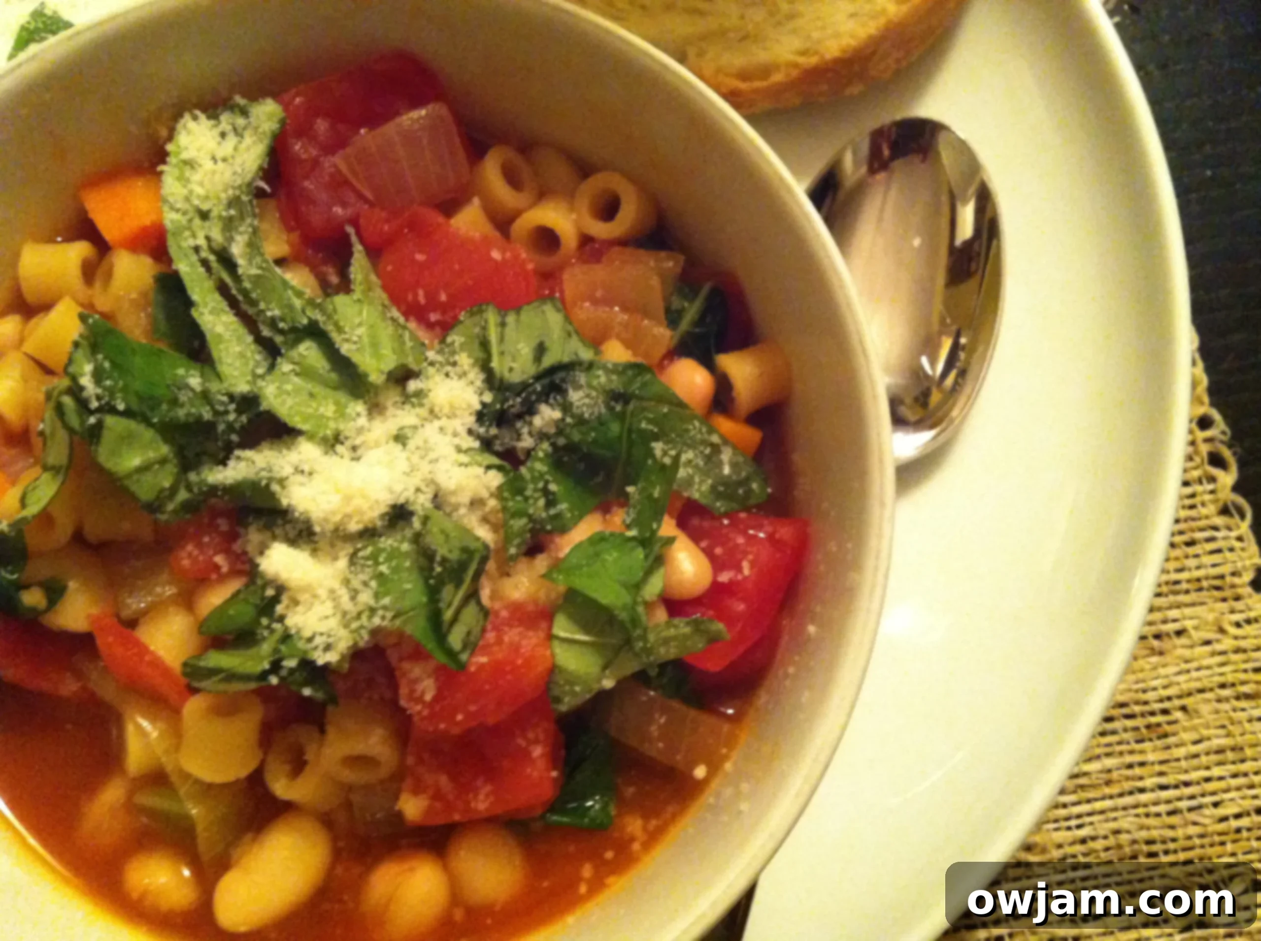 Delicious and vibrant Easy Minestrone Soup in a bowl, garnished with fresh herbs