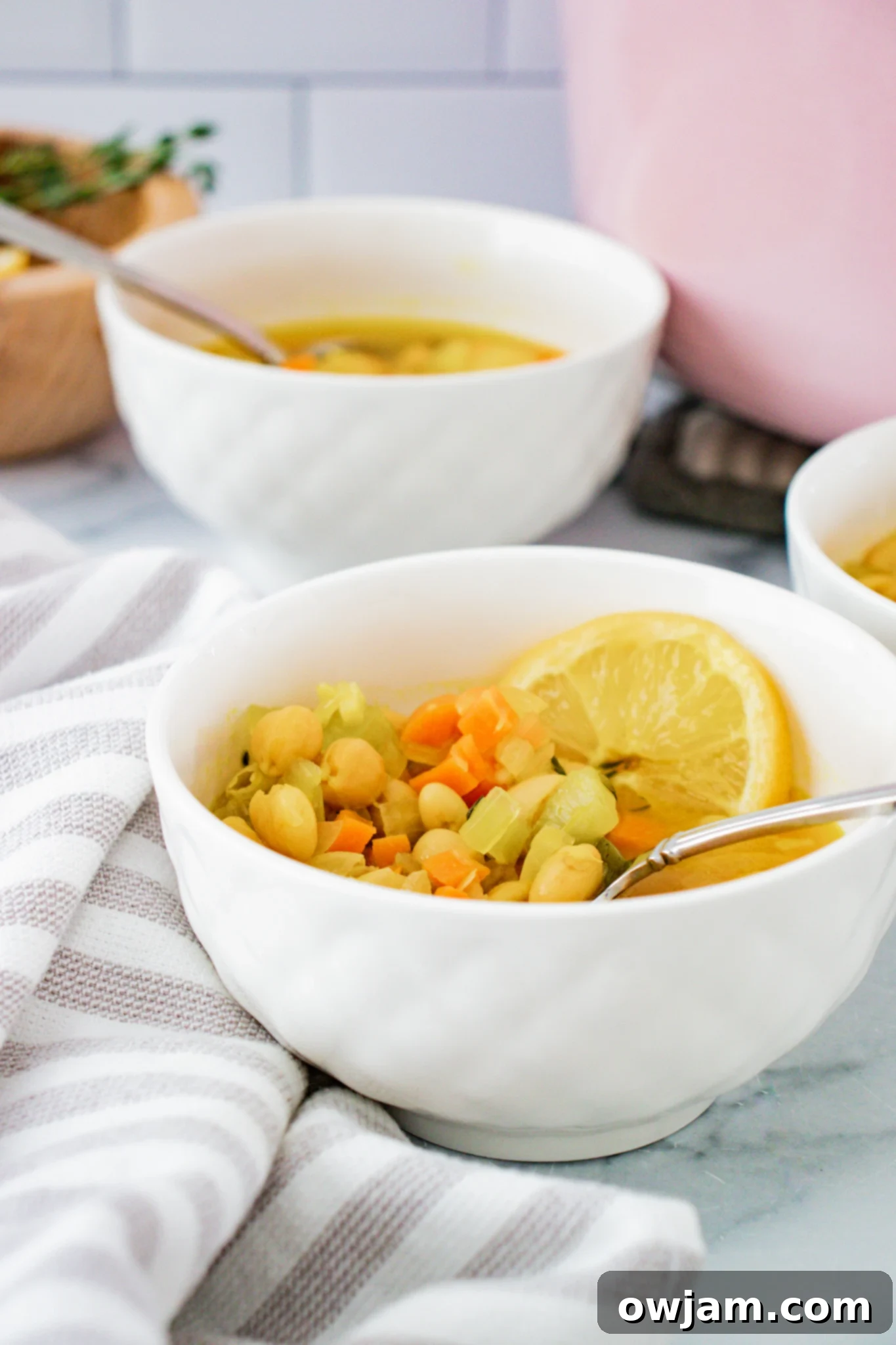Easy Vegetable Bean Soup Recipe with spoons in a white bowl