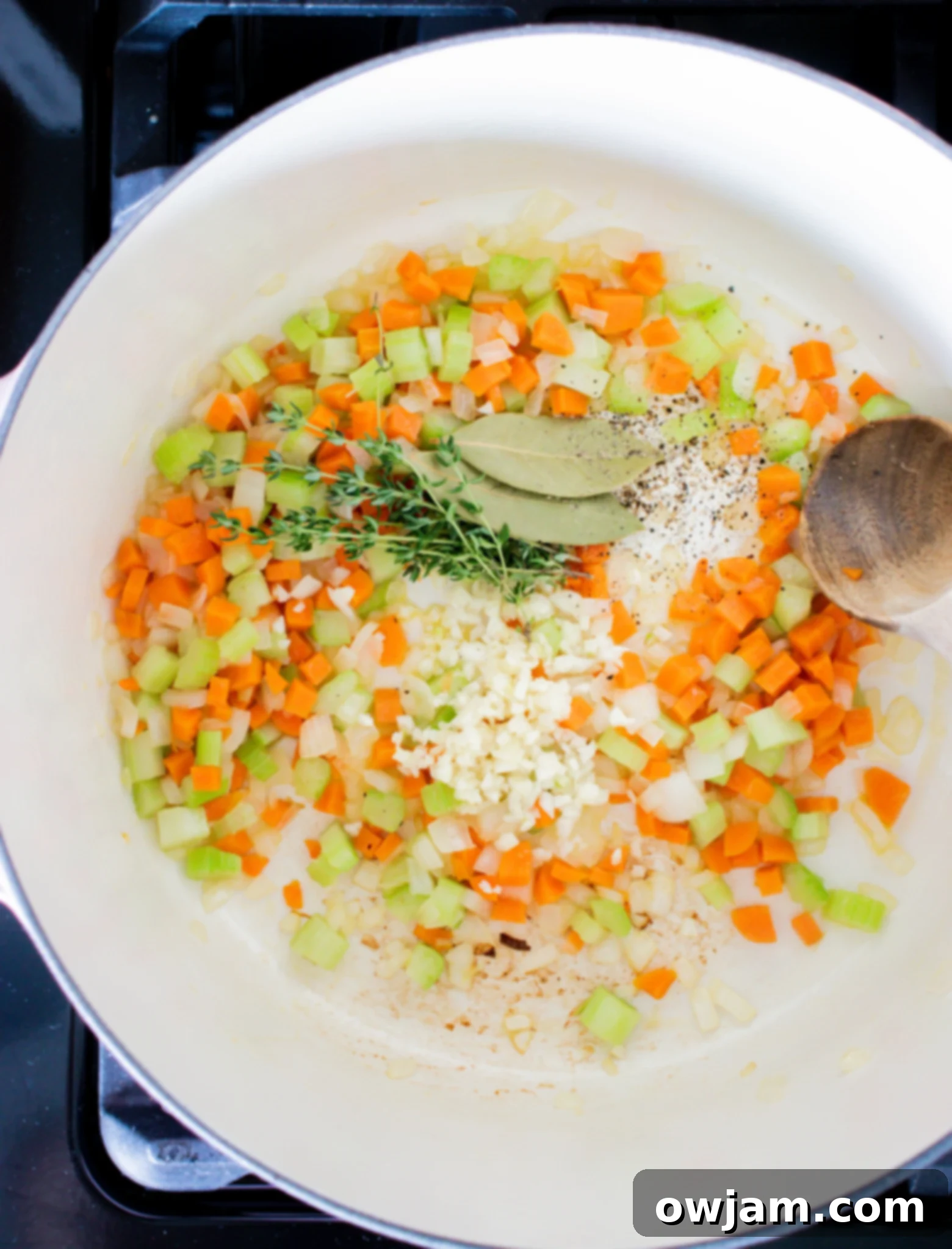 Effortless Vegetable Bean Soup 6 Easy Vegetable Bean Soup Recipe simmering in a dutch oven
