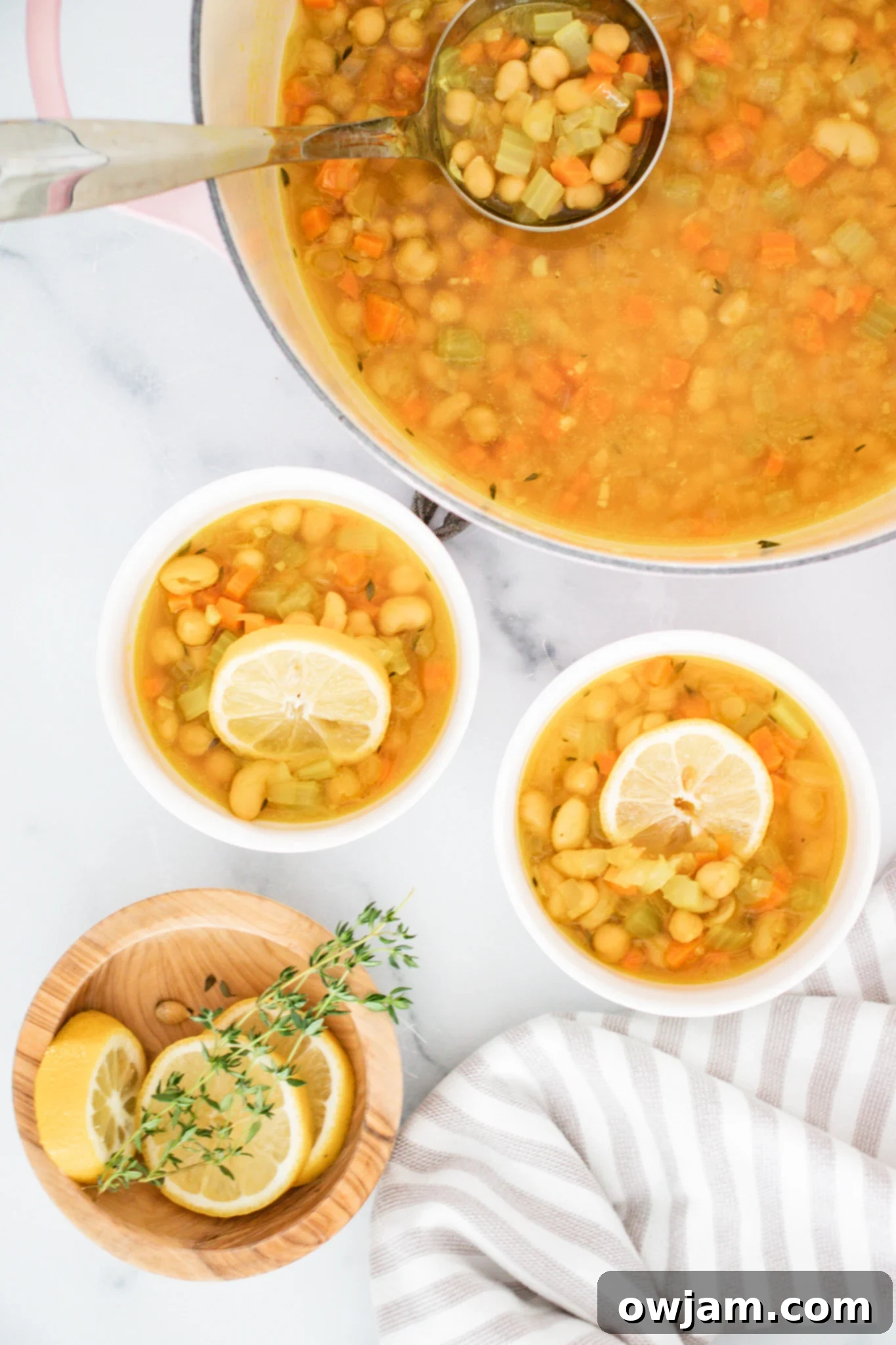 Effortless Vegetable Bean Soup 8 Easy Vegetable Bean Soup Recipe in white bowls with crusty bread