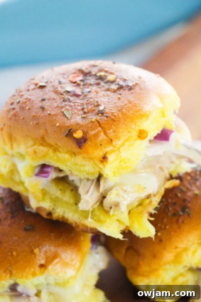 Easy Chicken Sliders on a cutting board, ready to be served