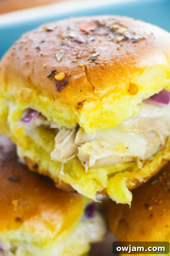 Easy Chicken Sliders up close, showing the melted cheese and juicy chicken