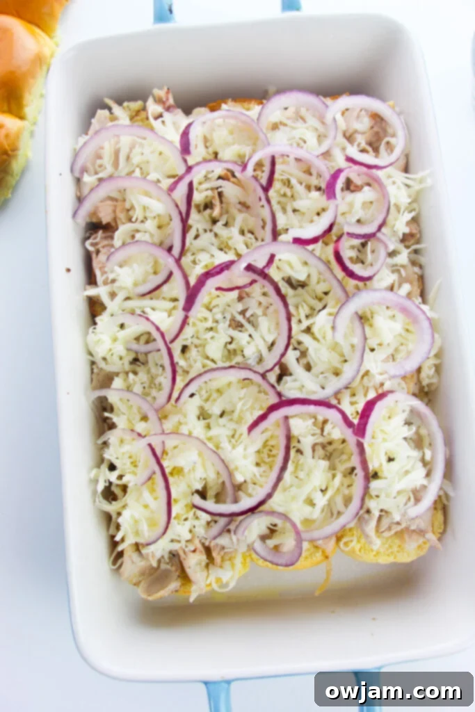 Easy Chicken Sliders with red onion on top