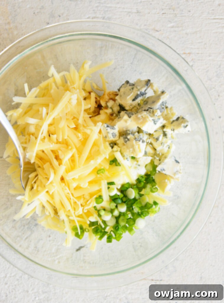 Whip Up a Crowd-Pleasing Cheese Ball 6 Cheese ball ingredients mixed in a bowl