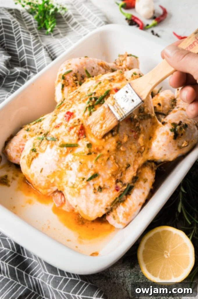 Whole Roasted Chicken with Potatoes with rub on the chicken