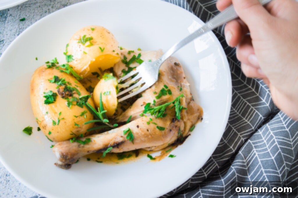 Whole Roasted Chicken with Potatoes with fork