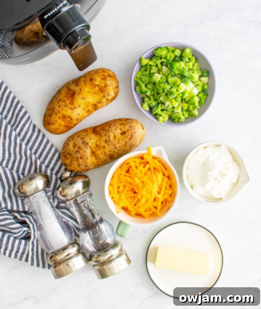 Raw ingredients for Air Fryer Twice Baked Potato, including potatoes, cheese, broccoli, and butter