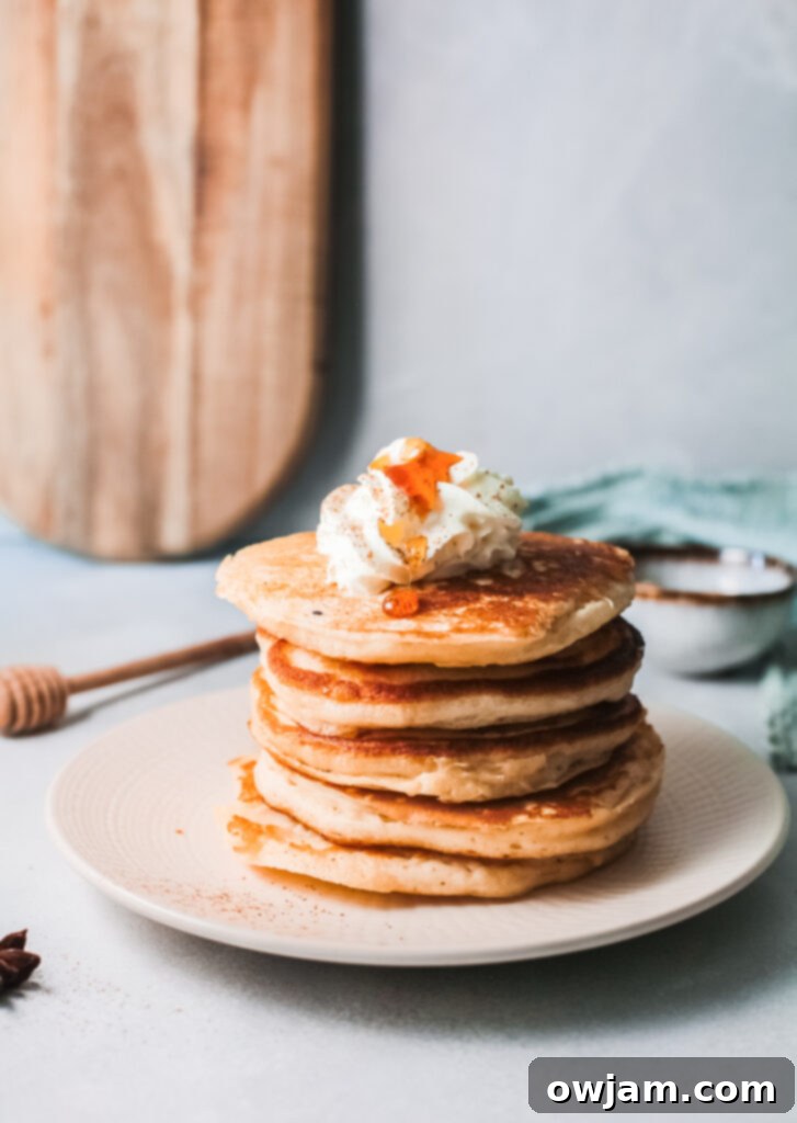 Eggnog Pancakes with whipped cream, ready to be served
