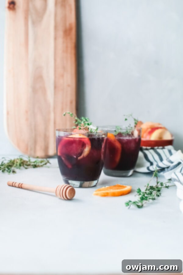 Your New Favorite Red Sangria 5 Red Sangria in glasses garnished with rosemary, star anise, and citrus