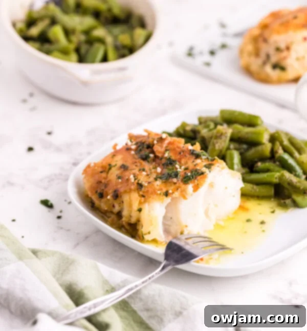 Golden Garlic Butter Cod 2 Pan Fried Garlic Butter Cod with fork