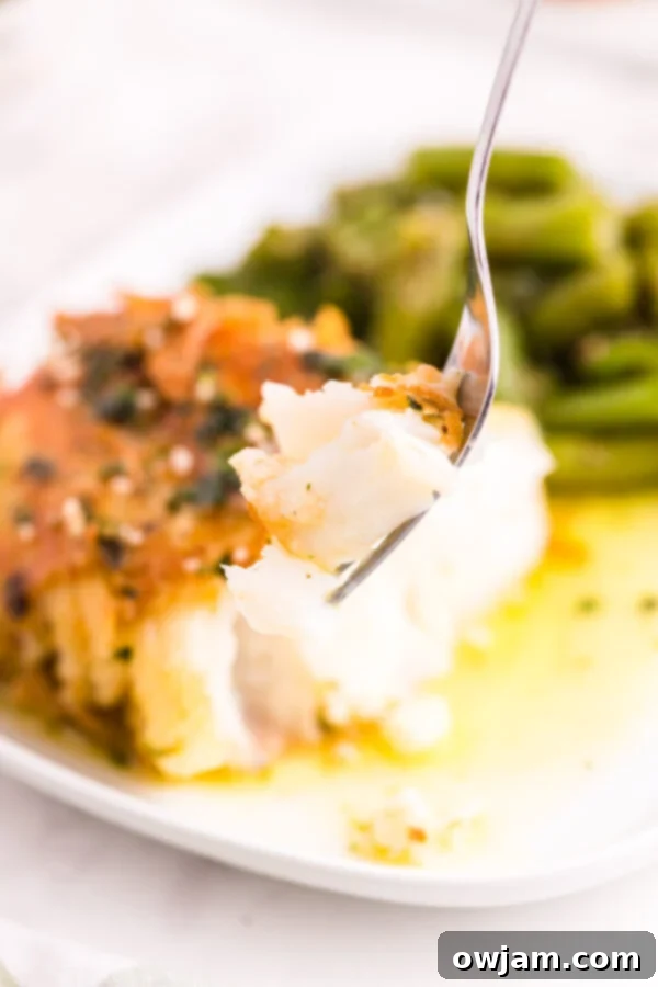Golden Garlic Butter Cod 4 Pan Fried Garlic Butter Cod with fork