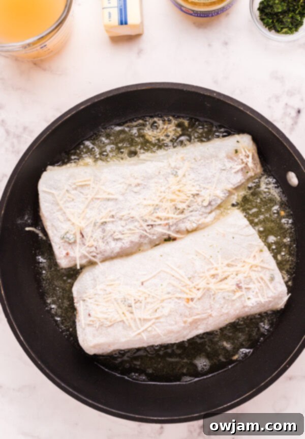 Pan Fried Garlic Butter Cod in skillet