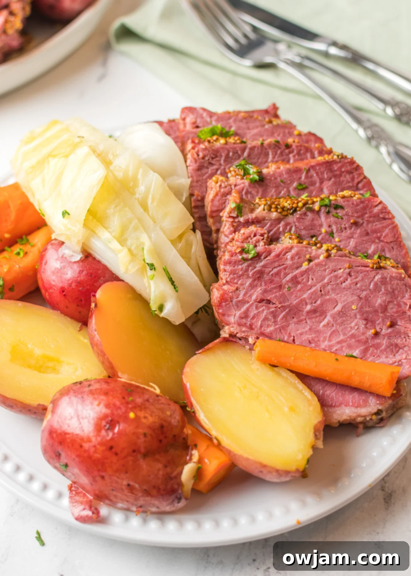 Tender Instant Pot Corned Beef and Cabbage 2 Platter of Instant Pot Corned Beef and Cabbage ready to serve