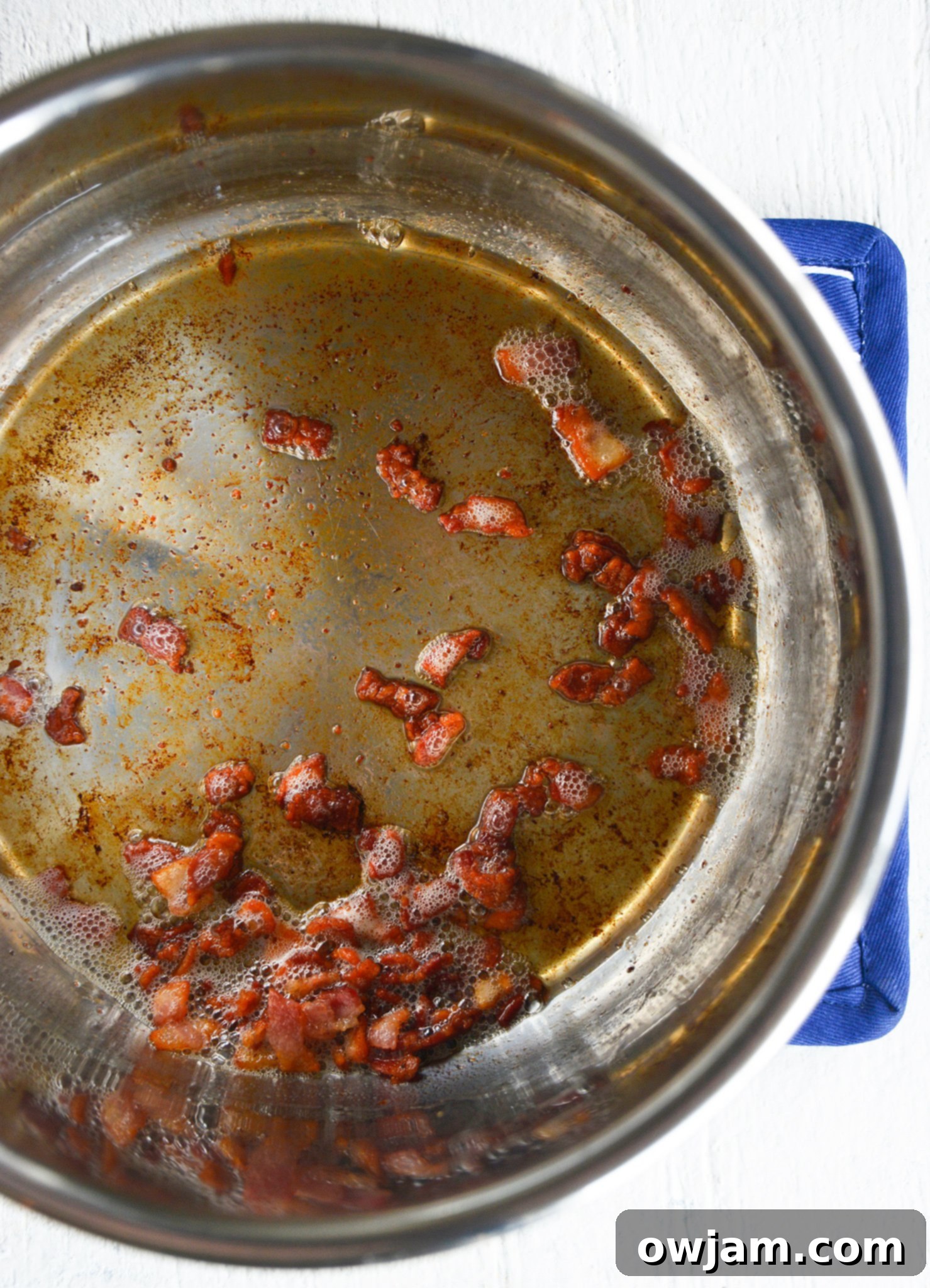 Instant Pot Cauliflower Soup bacon in the pressure cooker.