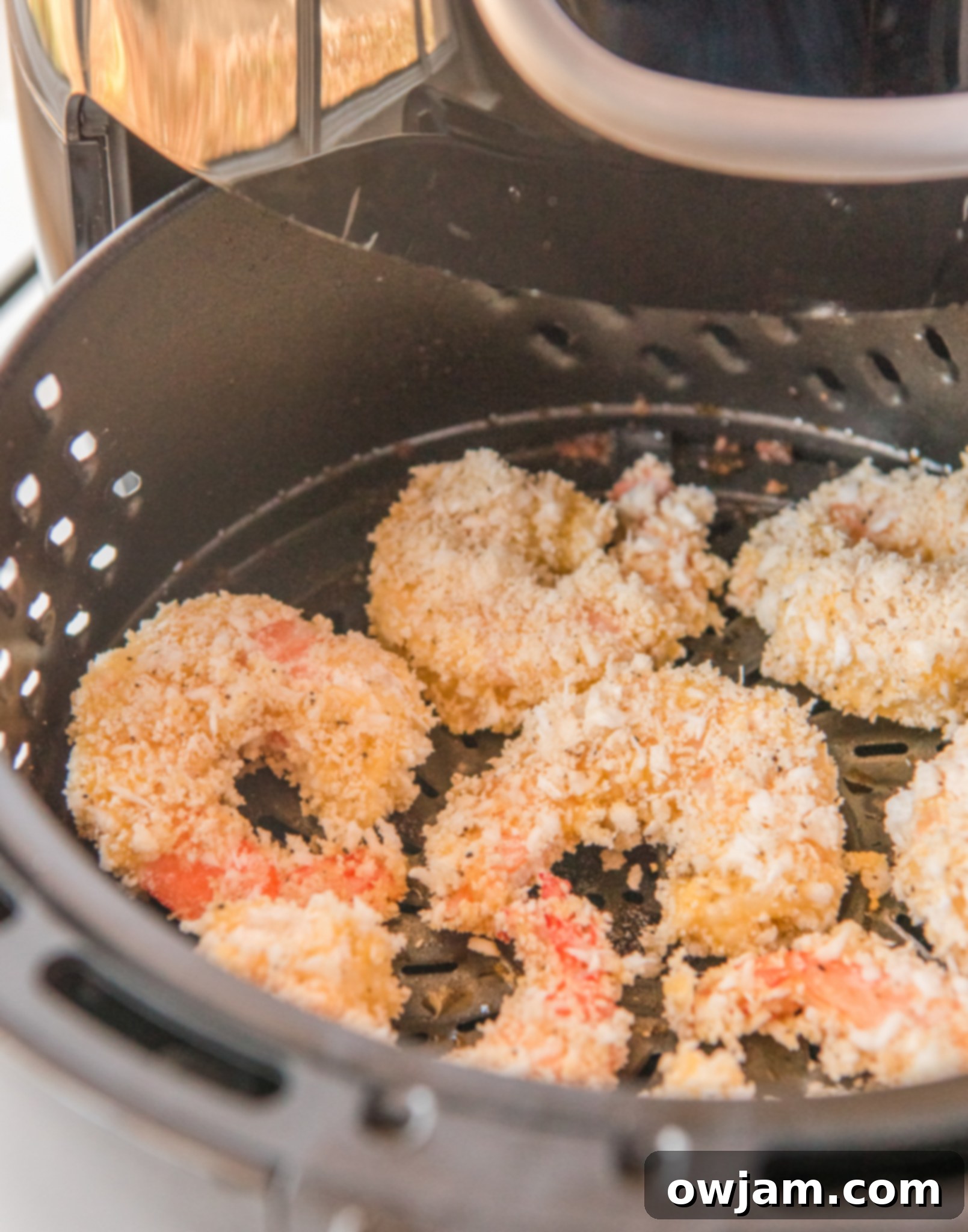 Golden Air Fryer Coconut Shrimp 12 Air Fryer Coconut Shrimp in the air fryer.