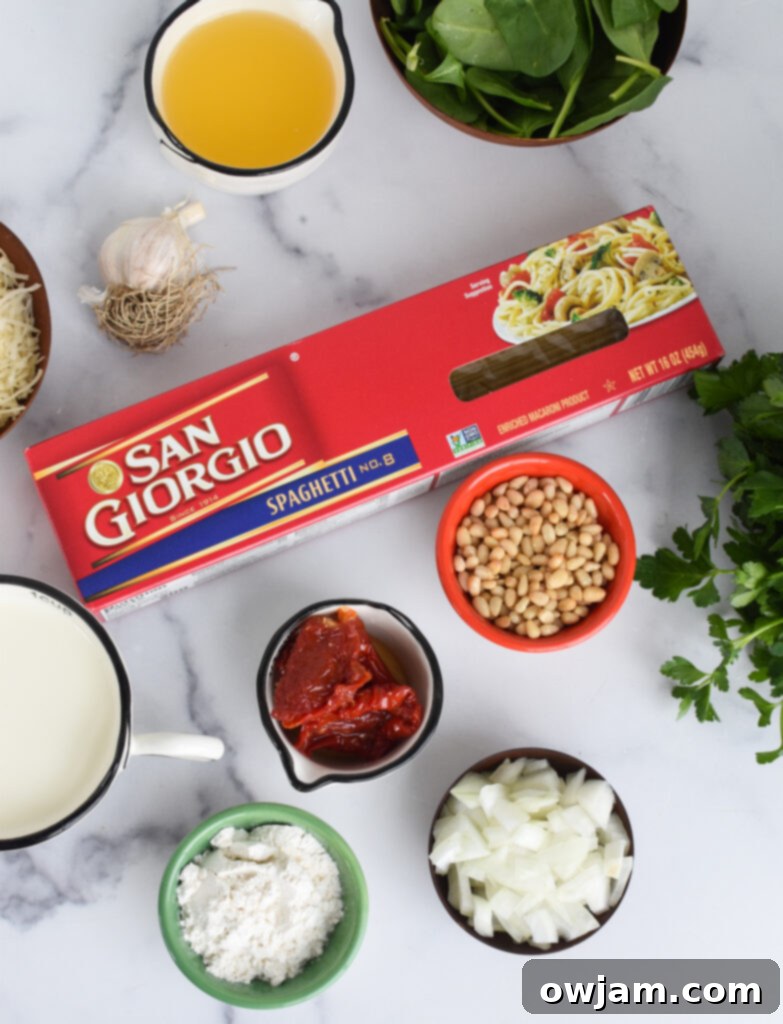 Creamy Sun-Dried Tomato Pasta 3 Creamy Sun Dried Tomato Pasta Recipe ingredients arranged neatly on a white board.