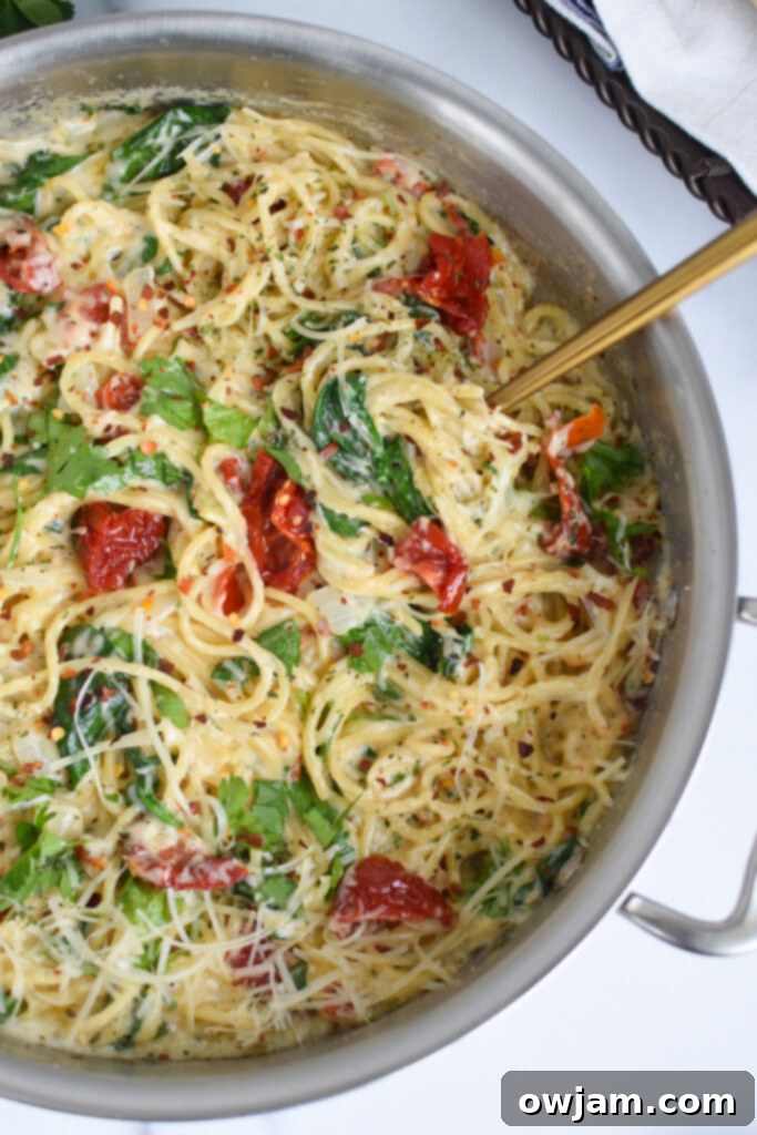 Creamy Sun-Dried Tomato Pasta 5 Creamy Sun Dried Tomato Pasta Recipe in a bowl with a fork, ready to be eaten.