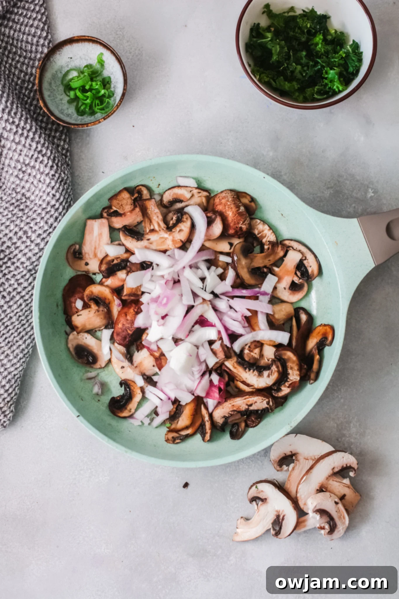 Delicious Korean Noodles in Minutes 8 Sautéed red onion and garlic in a skillet for Easy Korean Noodles.