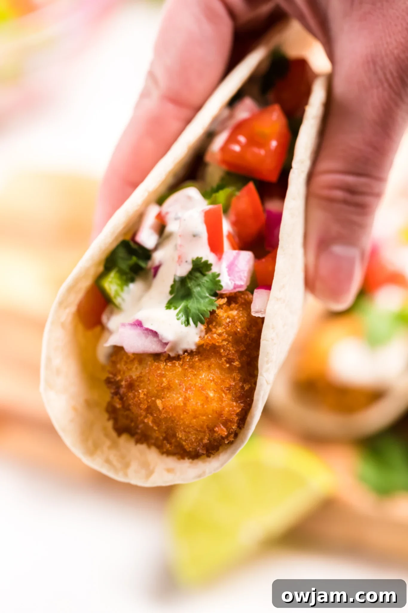 Air Fryer Tilapia in tacos with salsa.