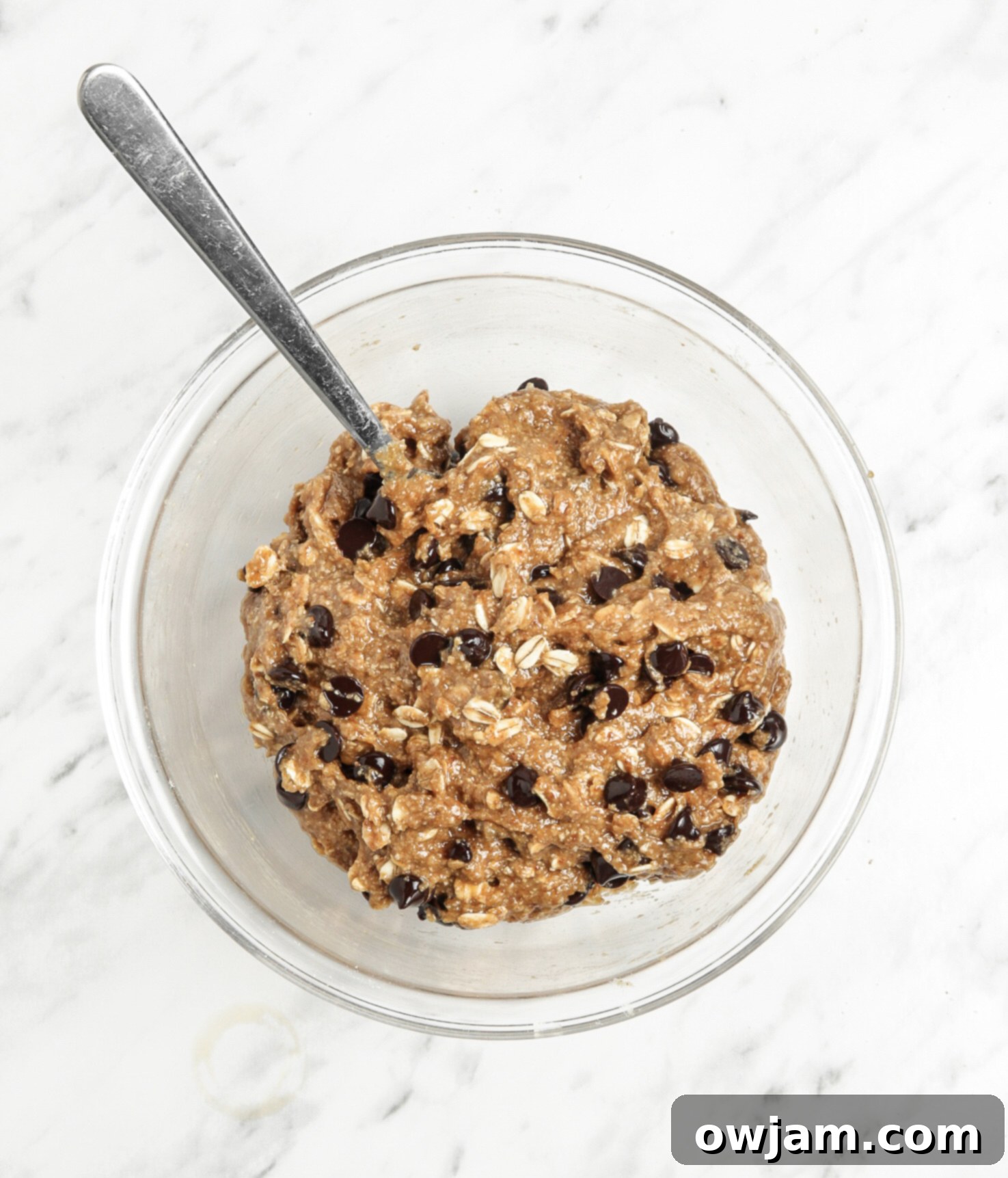 Wholesome Banana Oat Cookies 7 Homemade Banana Oatmeal Cookies with chocolate chips.
