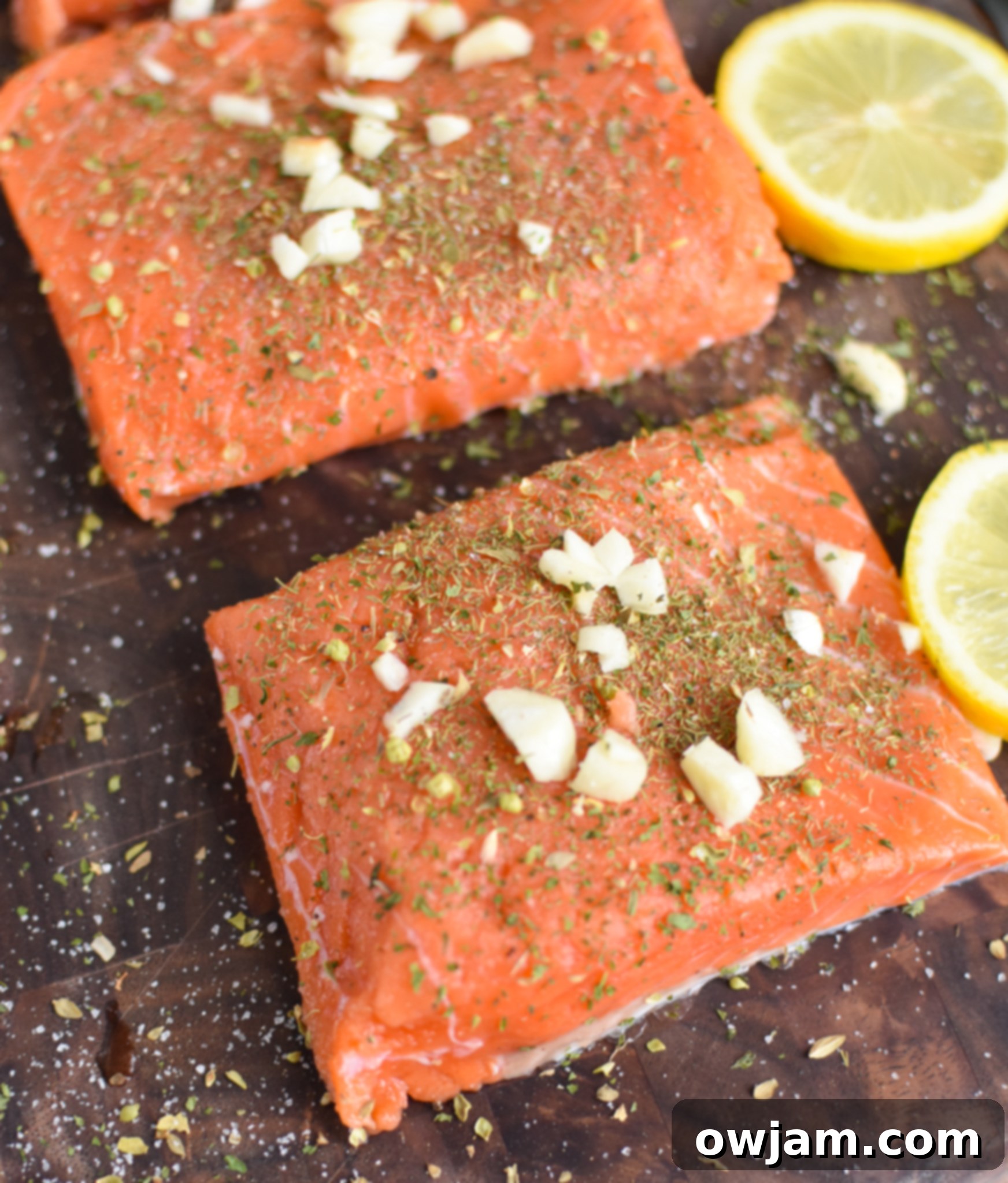 Zesty Greek Salmon Skillet 5 Pan Seared Greek Salmon on cutting board.