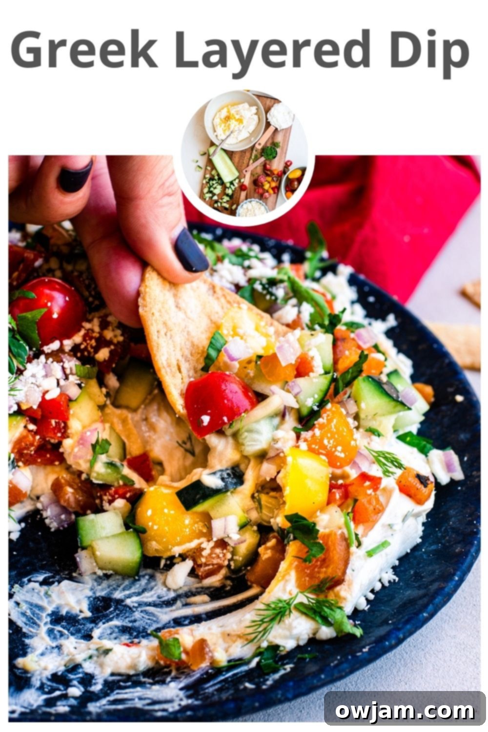 Beautifully garnished Layered Greek Dip ready to be served, with brand logo.