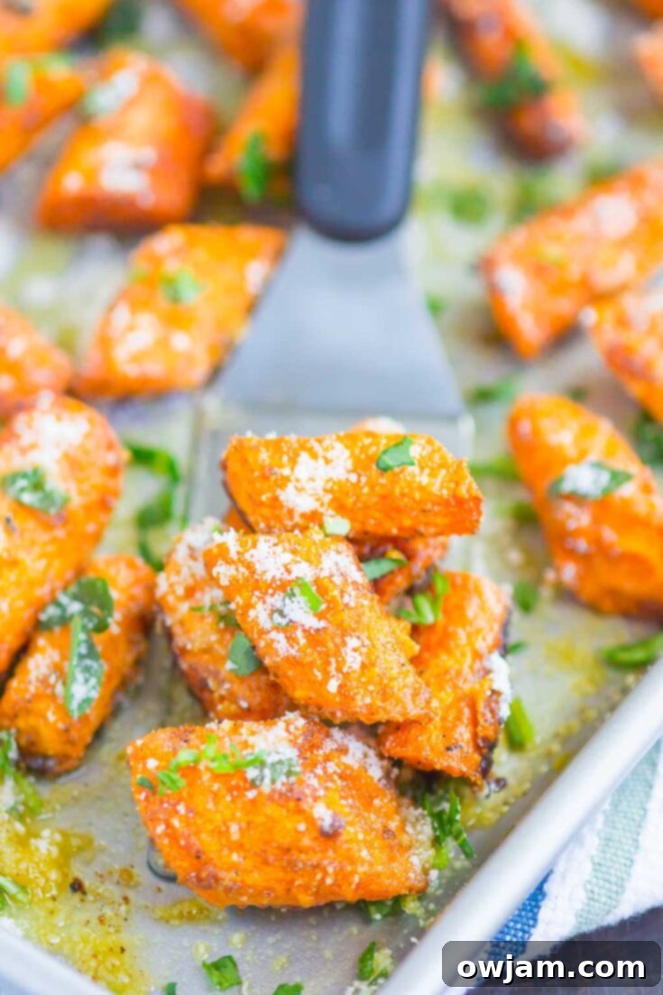 Sweet and savory Roasted Garlic Parmesan Carrots, an easy vegetable side.