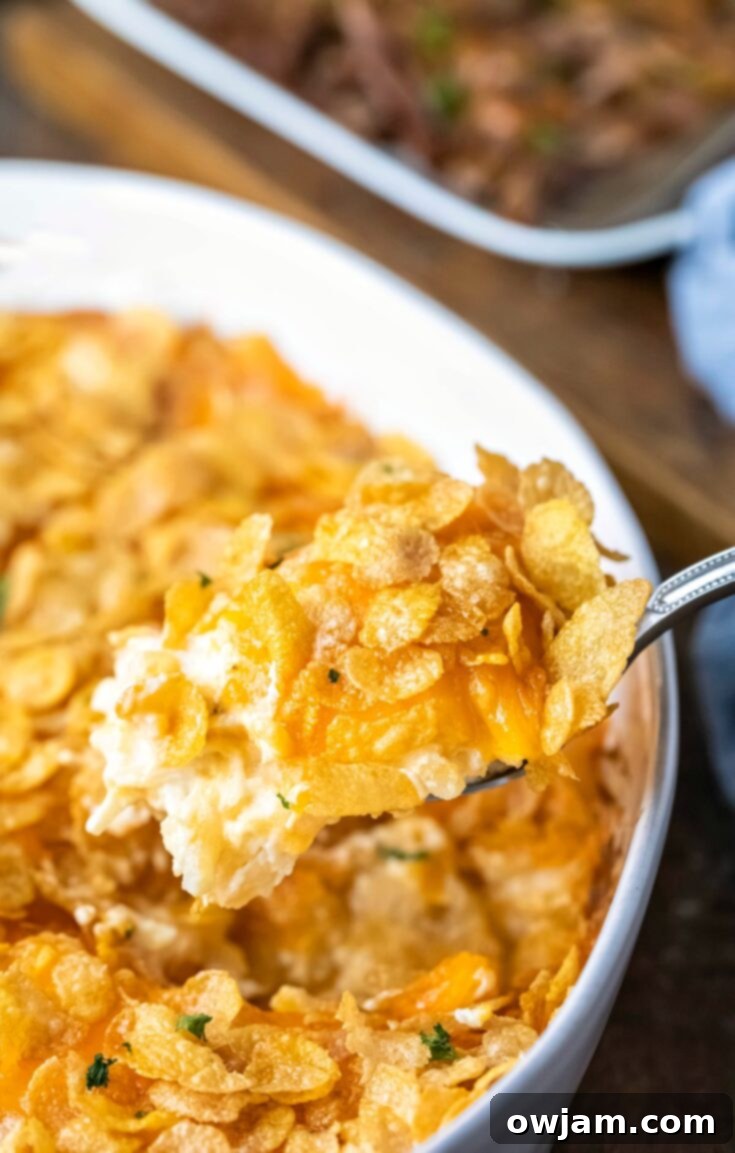 Comforting and cheesy Funeral Potatoes, an easy make-ahead casserole for steak dinners.