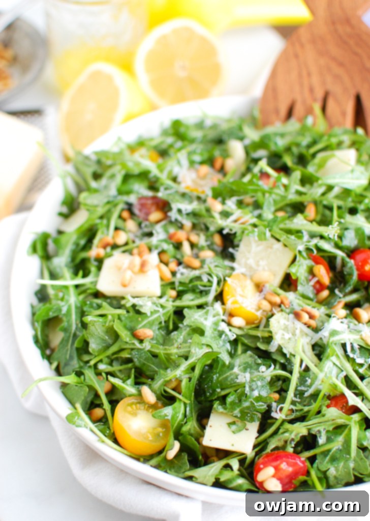 Peppery Lemon Arugula Salad with toasted pine nuts and parmesan, a light steak side.