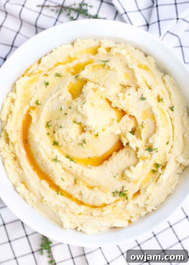 Creamy Brown Butter Mashed Potatoes with garlic and parmesan, a gourmet steak side.