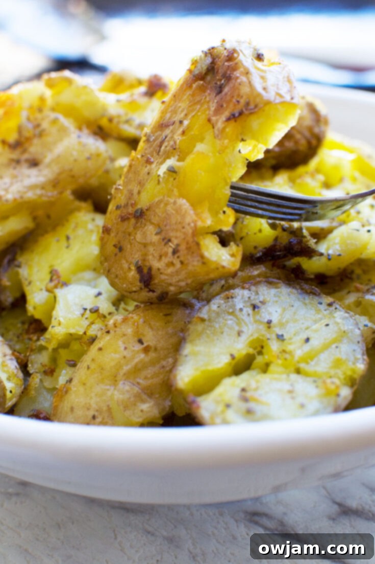 Crispy on the outside, soft on the inside Greek Style Crispy Smashed Potatoes, ideal for steak.