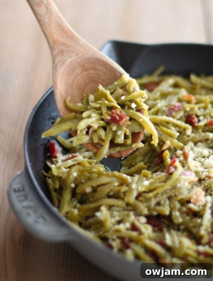 Quick and flavorful Firehouse Green Beans with Bacon, garlic, and parmesan.